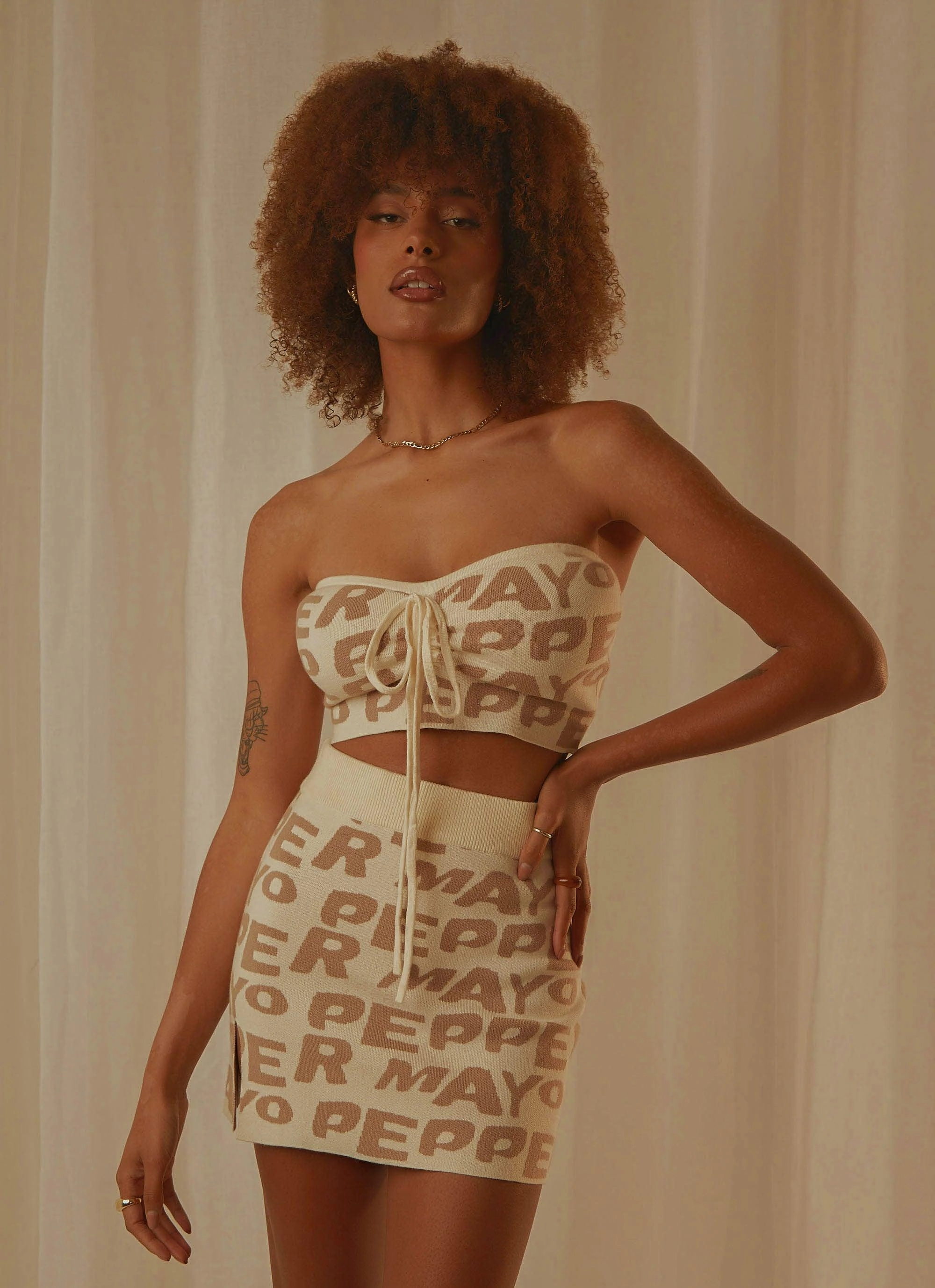 Layered Hem Design Easy Love Knit Mini Skirt - Latte Logo