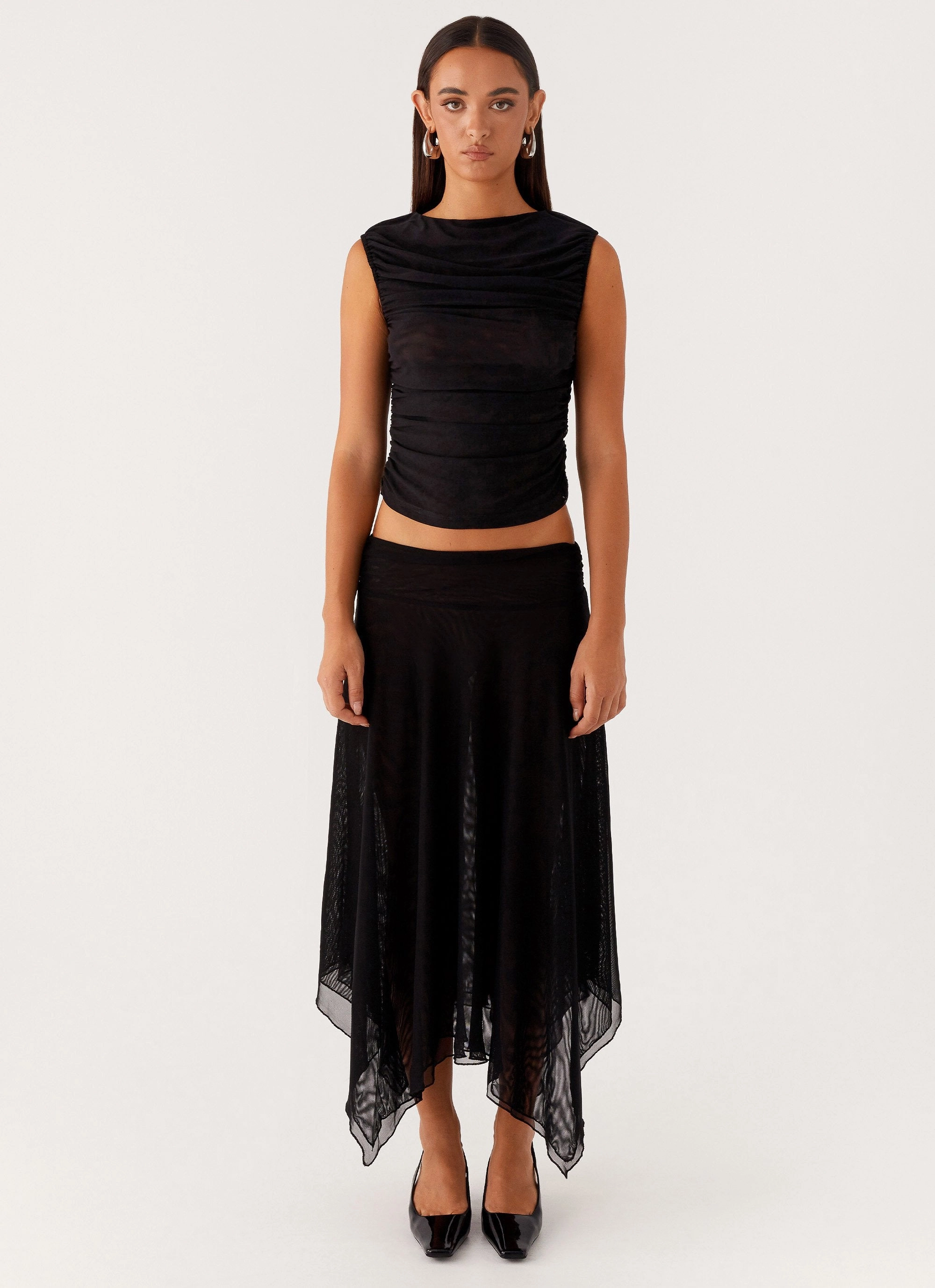 Softened Edges In The Atmosphere Mesh Top - Black